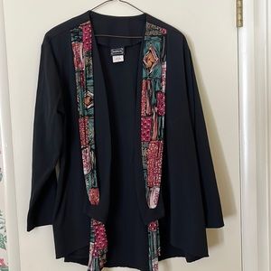 Black BonWorth jacket with attached multi-colored scarf, medium size.